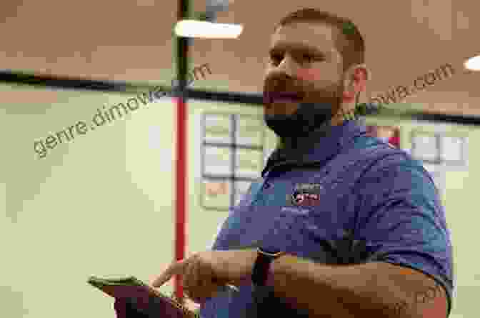 A Photograph Of A Wrestling Coach Instructing Students During A Physical Culture Wrestling Class Physical Culture Wrestling