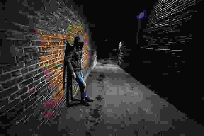 Booker Leaning Against A Wall In A Dark Alleyway, Shadows Obscuring His Face They Call Me Booker